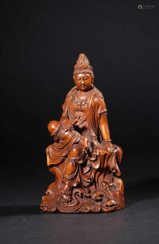 A CARVED BOXWOOD FIGURE OF GUANYIN,QING DYNASTY