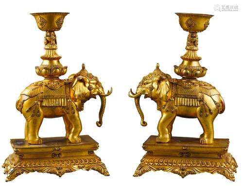 A PAIR OF GILT COPPER ELEPHANTS