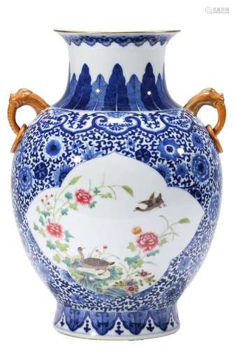 A BLUE AND WHITE FLOWER AND BIRD DOUBLE-EARS VASE