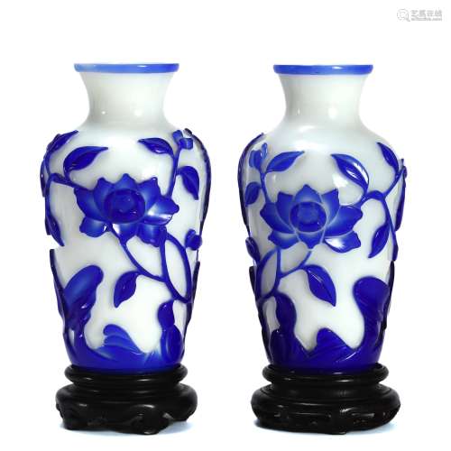 PAIR OF BLUE OVERLAY WHITE GLASSWARE FLORAL VASES