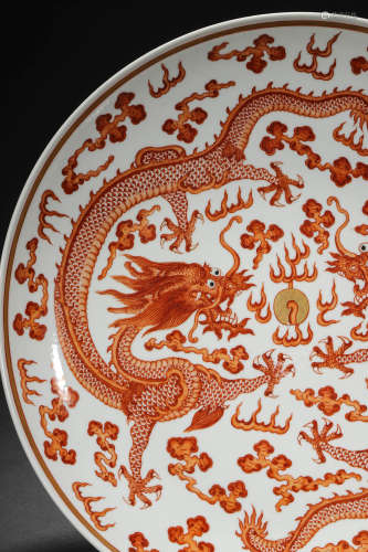 A LARGE IRON RED GLAZE DRAGON PLATE