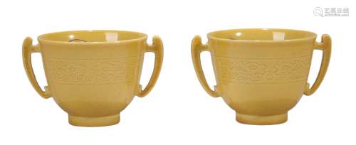 A PAIR OF YELLOW GLAZED DRAGON CUPS WITH DOUBLE EARS