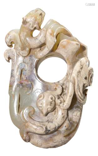 A JADE CARVED DRAGON PENDANT