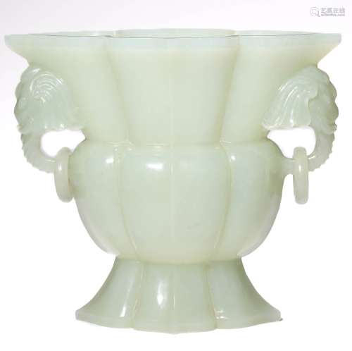 A HETIAN JADE CARVED DOUBLE-EARED FOLIATE-RIMMED CUP