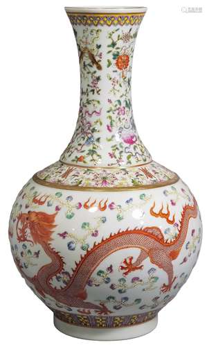 A FAMILLE ROSE DRAGON AND PHOENIX EIGHT TREATURES VASE