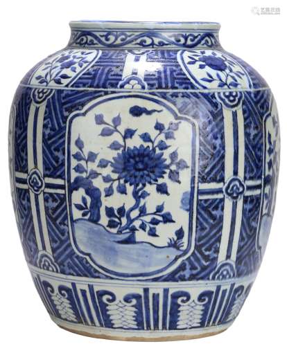A LARGE BLUE AND WHITE FLOWER JAR