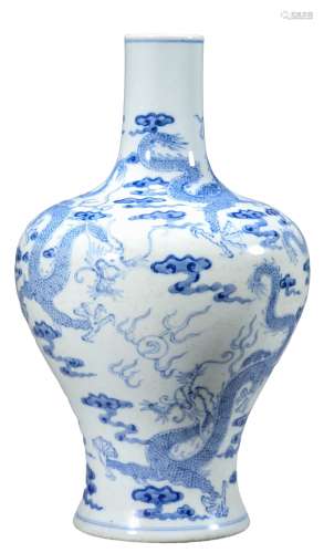 A BLUE AND WHITE DRAGON AND CLOUD VASE
