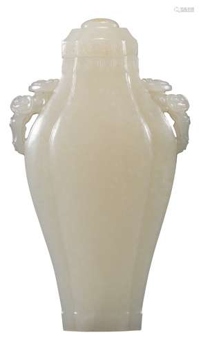 A WHITE JADE RUYI-EAR VASE