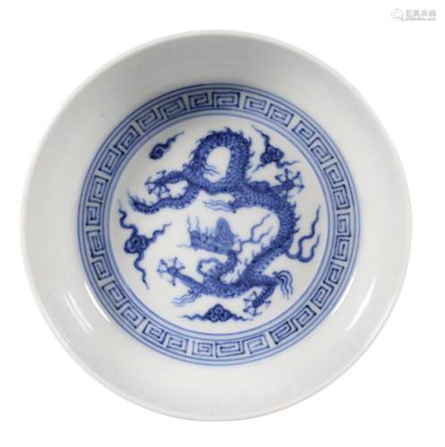 A BLUE AND WHITE DRAGON WASHER
