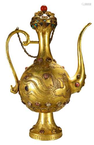 A GILDED PHOENIX EWER