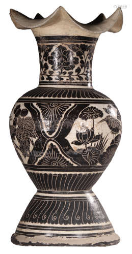 A CARVED CIZHOU BARBED-RIM VASE