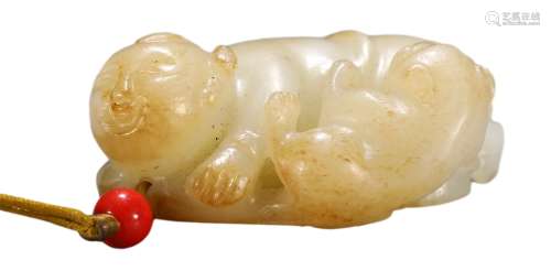 A HETIAN JADE CHILD CARVING