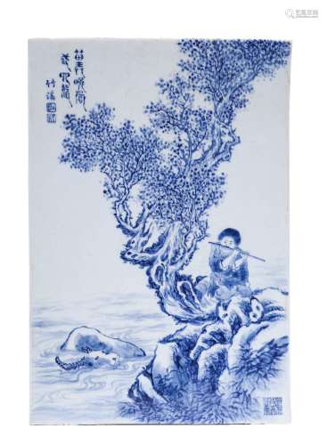 A BLUE AND WHITE FIGURE PLAQUE