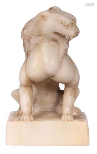 A MARBLE CARVING OF A LION