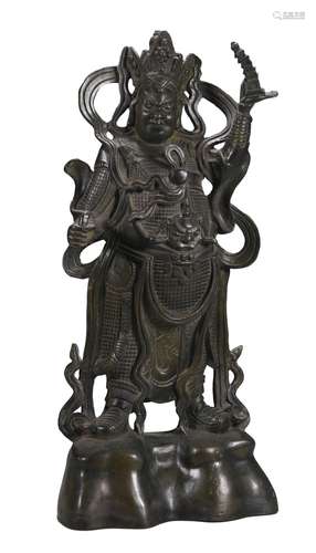 A COPPER FIGURE OF LOKAPALA