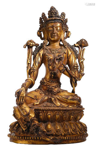 A GILT-COPPER FIGURE OF BUDDHA