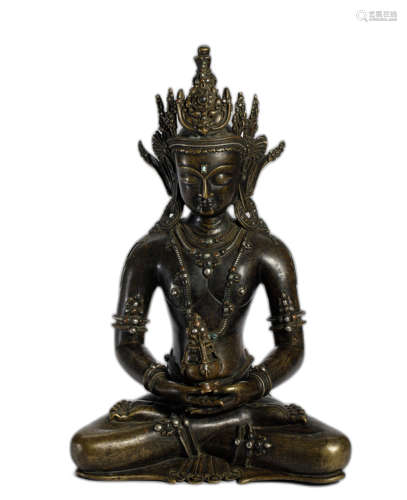 A COPPER ALLOY FIGURE OF
 AMITABHA