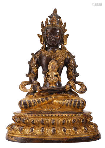 A GILT-COPPER FIGURE OF BUDDHA