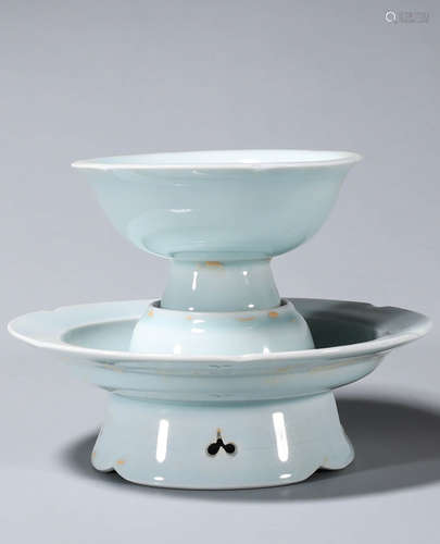 A HUTIAN CELADON GLAZED CUP AND CUP HOLDER