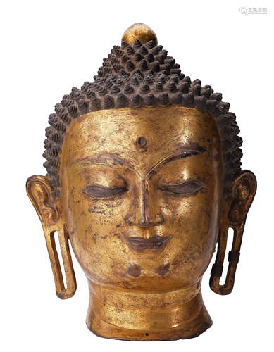 A GILT-COPPER FIGURE OF BUDDHA