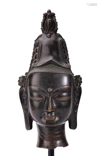 A COPPER FIGURE OF
BUDDHA