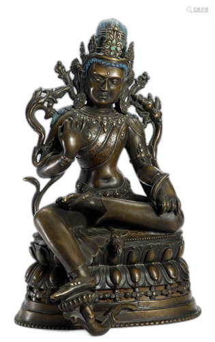 A COPPER ALLOY FIGURE OF
 GREEN TARA