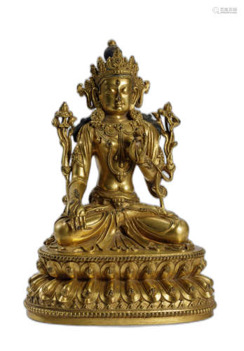 A GILT-COPPER FIGURE OF GREEN TARA