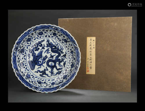 A LARGE BLUE AND WHITE DRAGON AND PHOENIX DISH