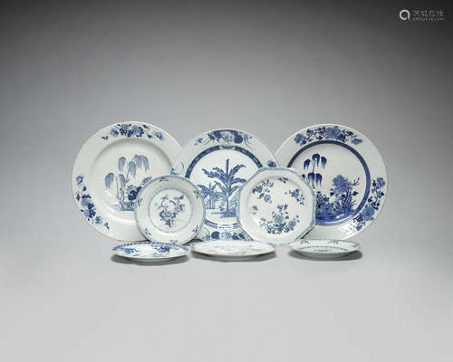 Four large blue and white export plates and five smaller.  Qianlong