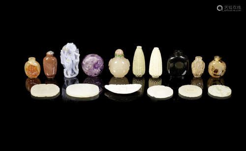 A group of snuff bottles and jade plaques.  Qing Dynasty and later