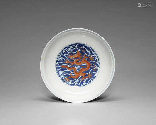 An iron-red and underglaze-blue 'dragon' dish.  Qianlong seal mark and of the period