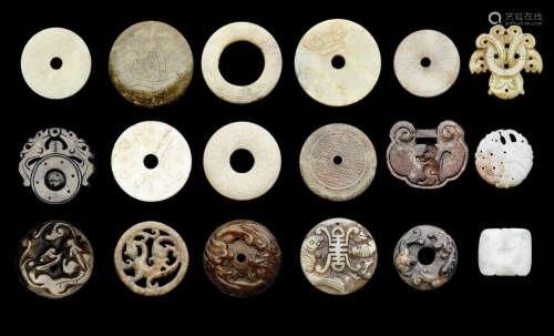 A group of eighteen pendants and bi discs