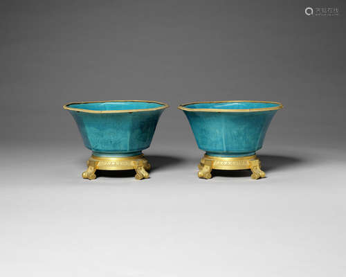 A pair of turquoise-glazed, European gilt-metal mounted bowls.  The porcelain 18th century, the mounts 19th century