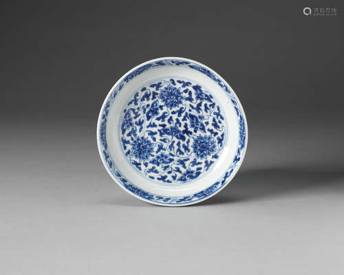 A blue and white saucer dish.  Kangxi six-character mark and of the period