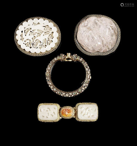 Three gilt-bronze and hardstone belt-buckles.  Qing Dynasty