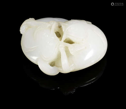 A white jade carving of two catfish