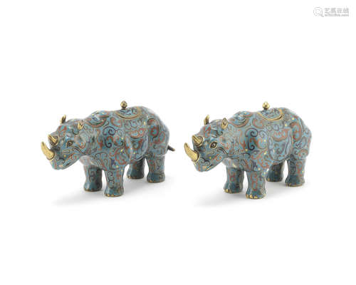 A pair of cloisonné enamel rhino vessels