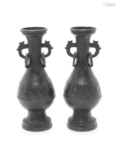 A pair of bronze pear shaped vases.  Yuan/Early Ming Dynasty