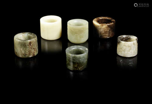 A group of six jade thumb rings.  Qing Dynasty and later