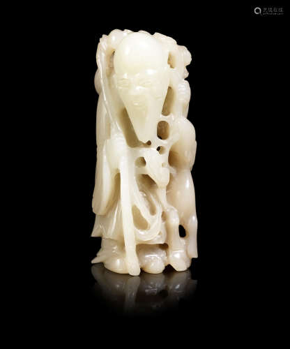 A pale green jade figure of Shoulao.  18th/19th century