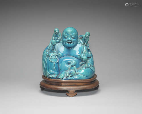 A turquoise-glazed figure of Budai.  19th/20th century