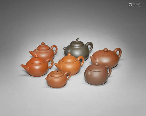 A globular Yixing teapot.  Impressed Gu Jingzhou seal mark