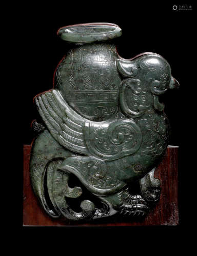 A spinach green jade archaistic bird plaque.  20th century