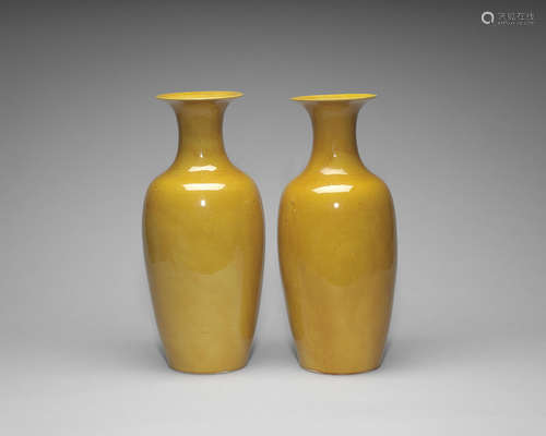 A pair of yellow-glazed baluster vases.  19th/20th century