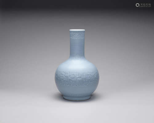 A clair-de-lune-glazed carved archaistic bottle vase.  19th century