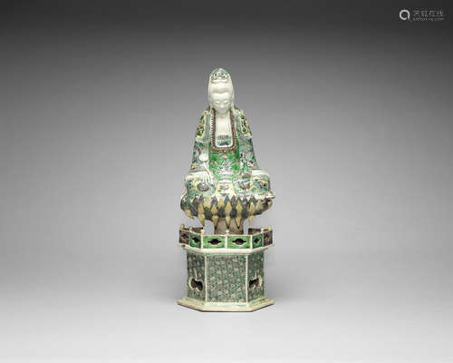 A famille verte biscuit model of Guanyin.  Kangxi