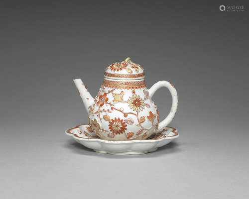 A rouge-de-fer teapot, cover and stand.  18th century