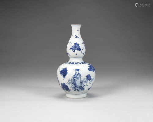 A blue and white double-gourd vase.  Chongzhen