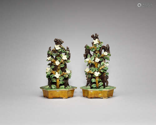 A pair of famille verte biscuit models of jardinières.  Kangxi