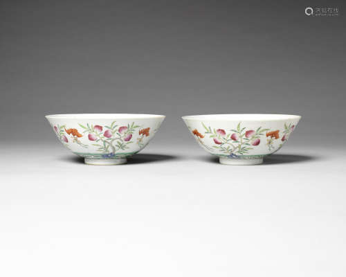 A pair of famille rose 'bats and peaches' bowls.  19th century